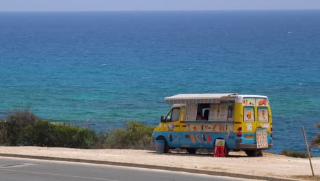 ice cream truck by the ocean