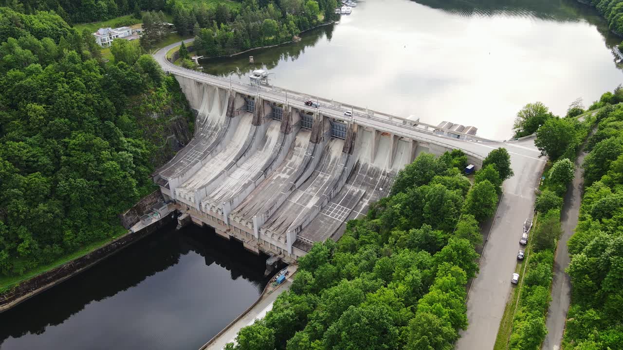 Aerial shot of Slapy Dam blending engineering with nature in Czech Republic