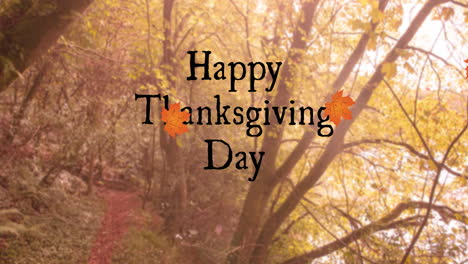 digital composition of happy thanksgiving day text and autumn maple leaves floating against forest