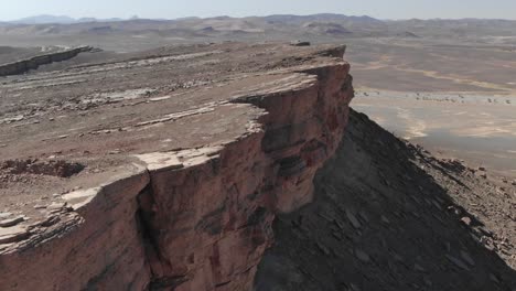 cliff at gara medouar rock formation in errachidia region, morocco