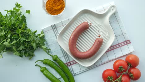 turkish sucuk sausage with herbs and vegetables