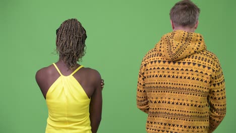 young multi-ethnic couple being sad together