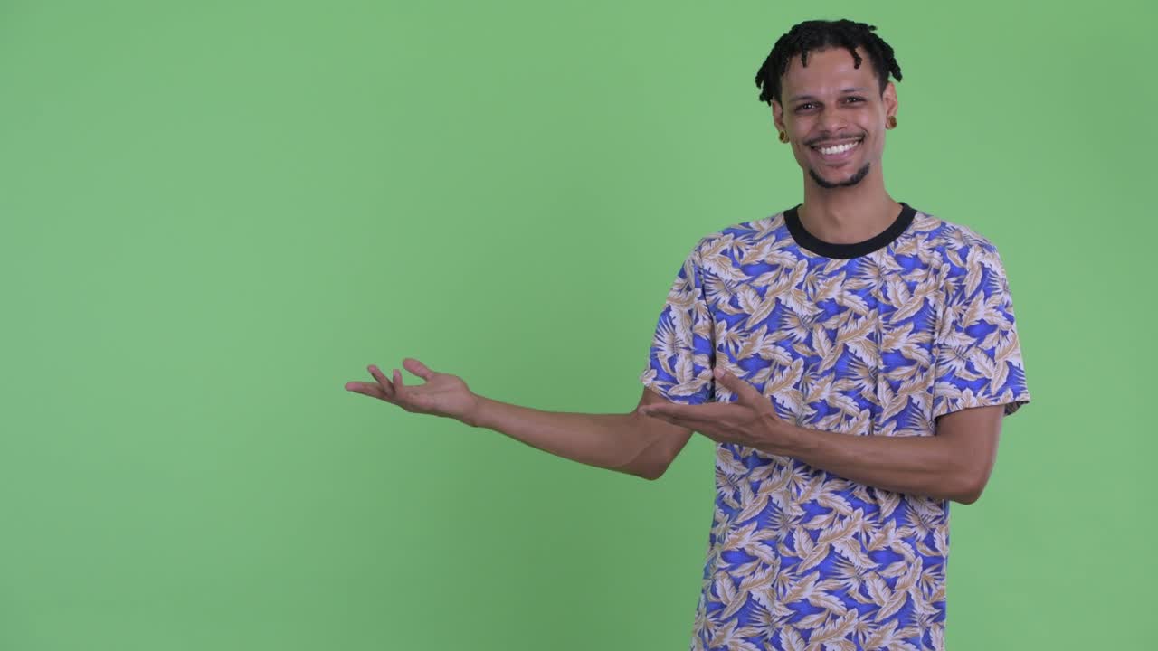 Young handsome African man with dreadlocks