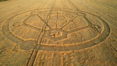 crop circle fortnite molecular geometry pattern aerial view on wiltshire sunset wheat field countryside slow low push in
