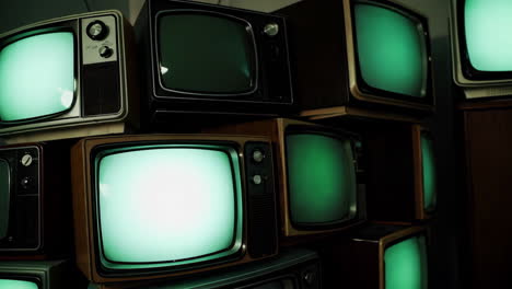 vintage televisions stacked