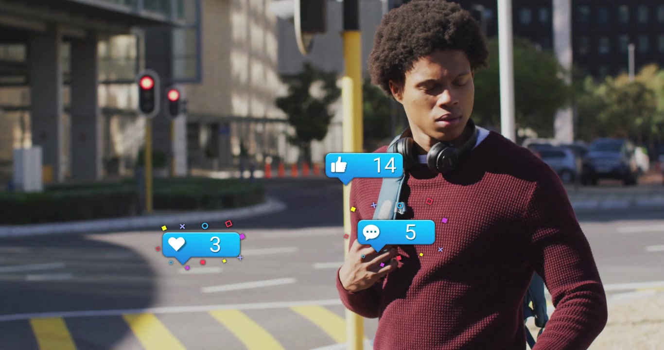 man waiting at crosswalk tapping smartwatch tracking social media icons rising engagement counts