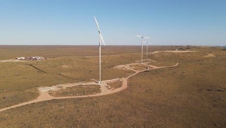 4k-Windturbinen-Bei-Sonnenuntergang-Luftaufnahme-Erneuerbare-Energie-Zeitlupe-60fps