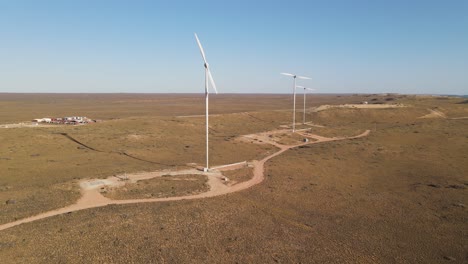 4k wind turbines at sunset aerial shot renewable energy slow motion 60fps