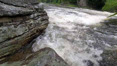 the linville river flows just below linville falls