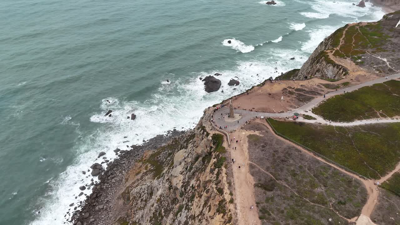 Aerial view of a scenic coastline with people