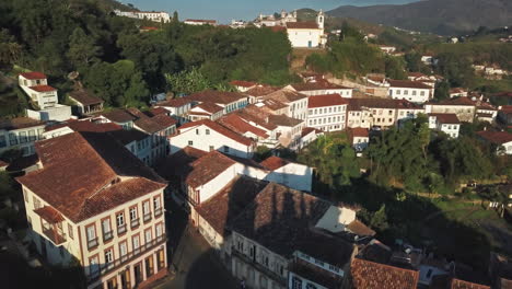 aerial shot reversing over cathedral and unesco heritage site ouro preto, brazil