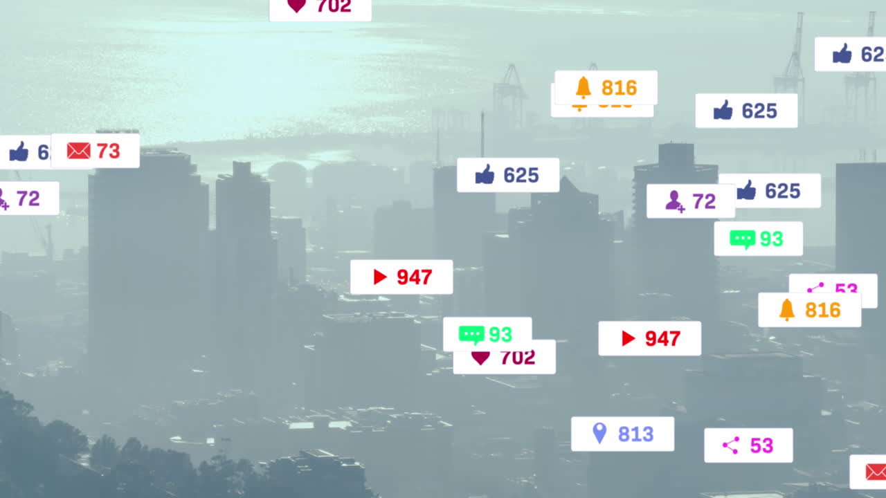 여러 소셜 미디어 아이콘의 애니메이션이 도시 풍경의 공중 전망에 대해 떠다니고 있습니다.