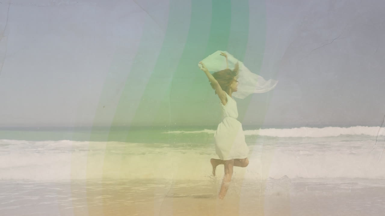 Running on beach, woman in white dress with colorful animation overlay