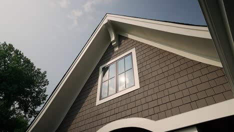 Exterior-home-window-with-sun-reflection