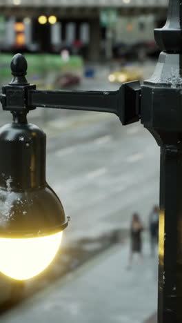 a street lamp on a snowy city street