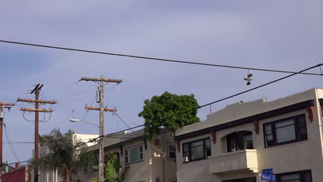 A-nice-low-angle-of-tennis-shoes-on-a-line-as-a-FedEx-plane-lands-in-Southern-California-2