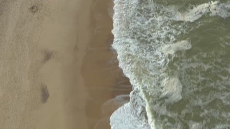 slow reveal shot of amazing, beautiful, endless british coast line and the golden sand beaches