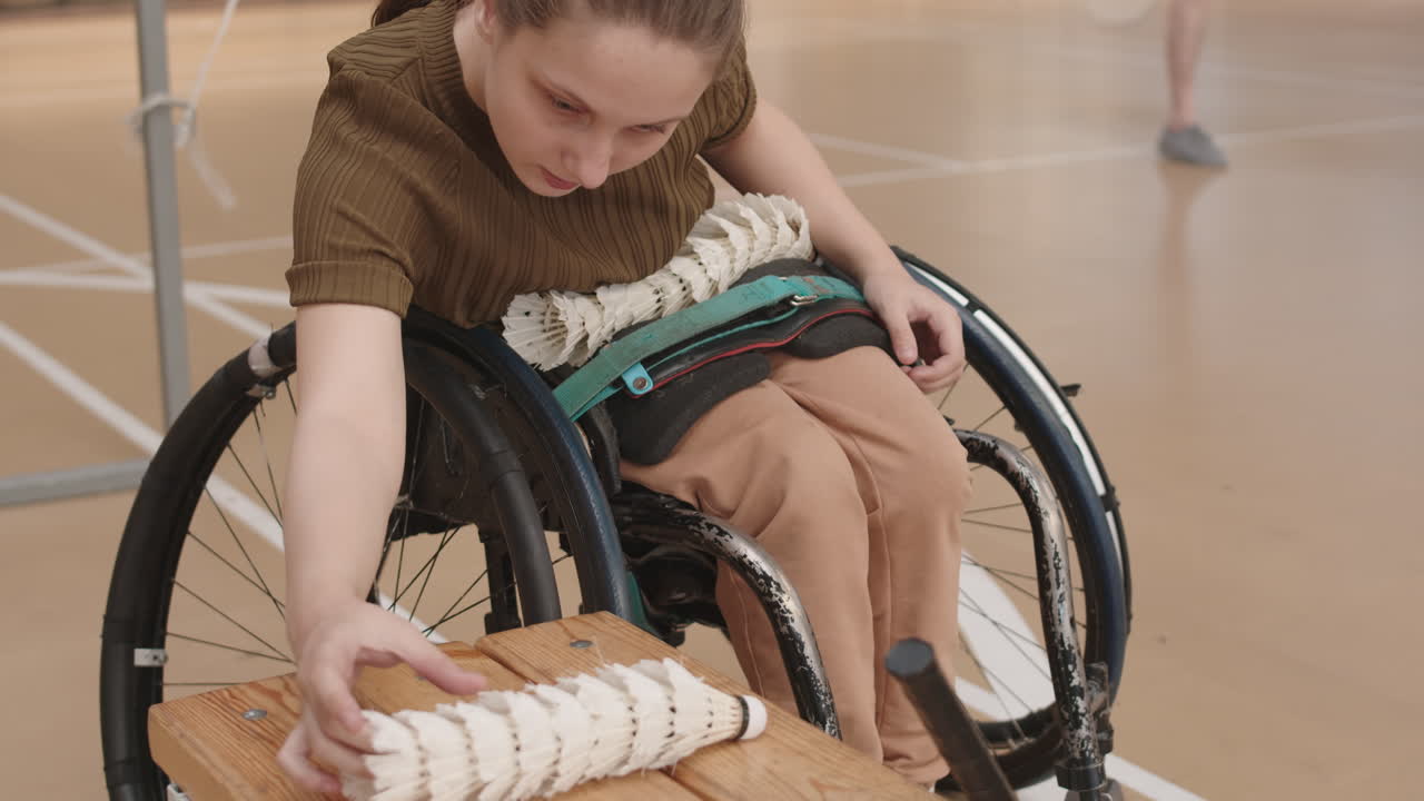 Girl with Disability Counting Shuttlecocks