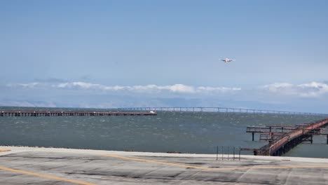airplane preparing for landing on san francisco international airport, california usa