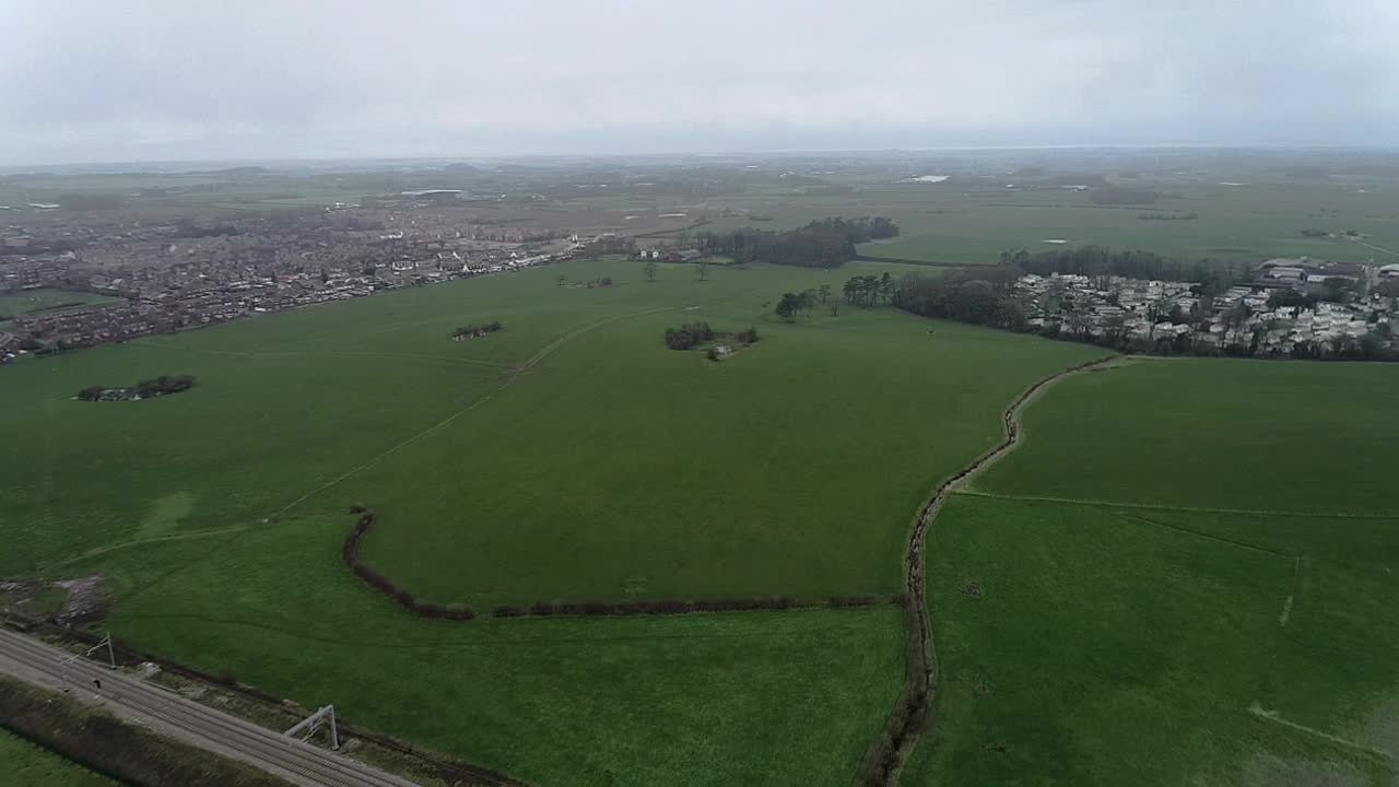 Flight accross field and over a train line over Kirkham