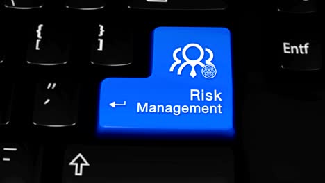 risk management moving motion on blue enter button on modern computer keyboard with text and icon labeled. selected focus key is pressing animation. business management concept