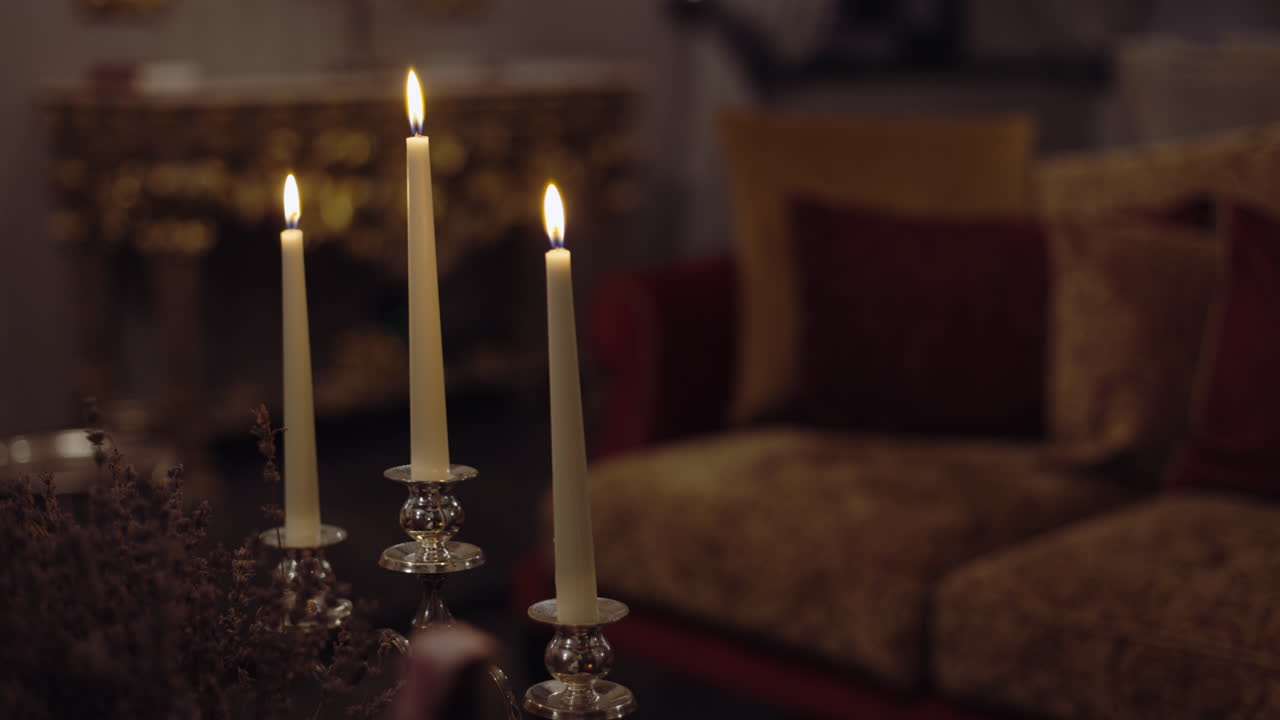 Elegant Candles Illuminating a Dimly Lit Interior