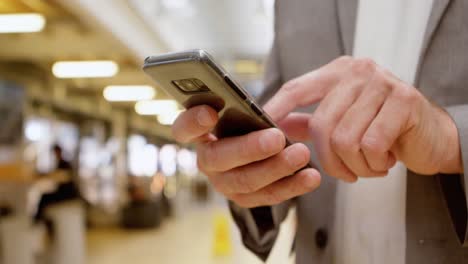 businessman using mobile phone in office 4k