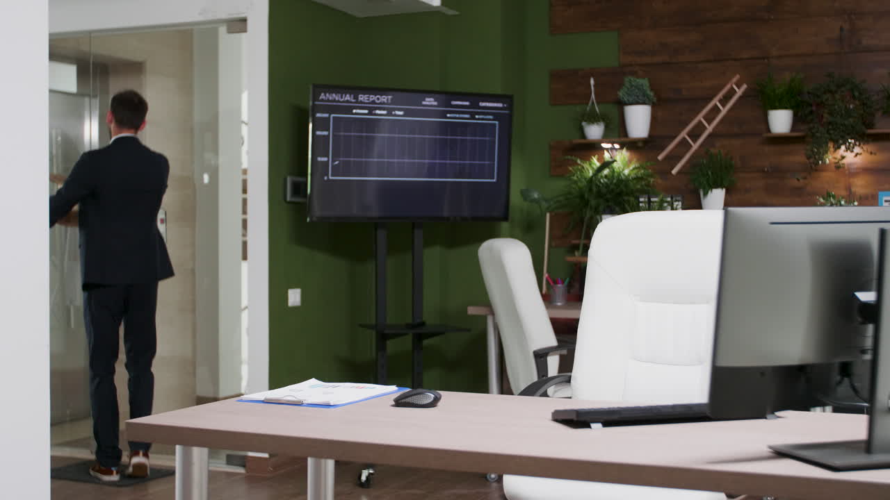 Office Setting with Businessman Leaving