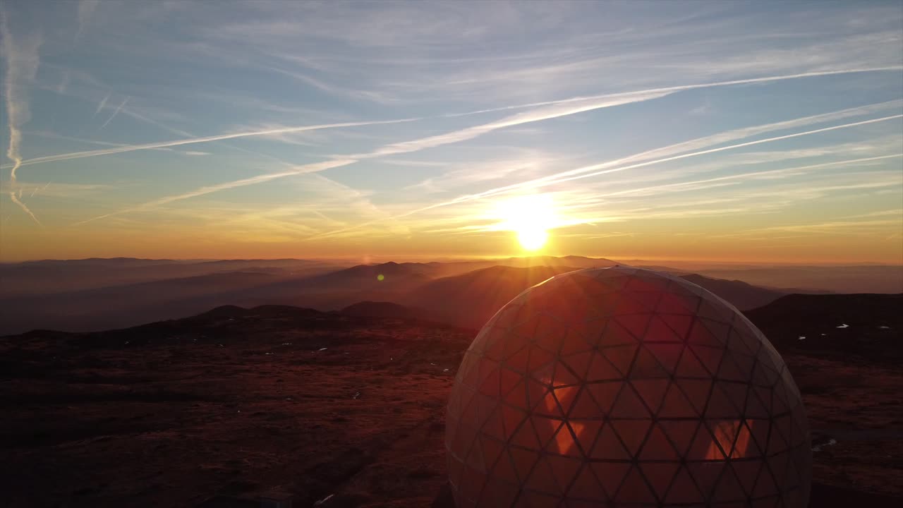 Sunset over Mountains with Radar Dome
