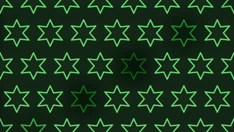 simetría estelar verde sobre un fondo negro