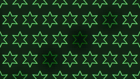 green starry symmetry on black background