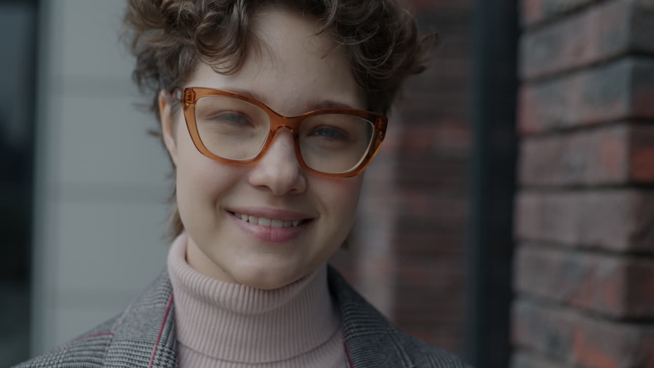 Woman with Curly Hair and Glasses
