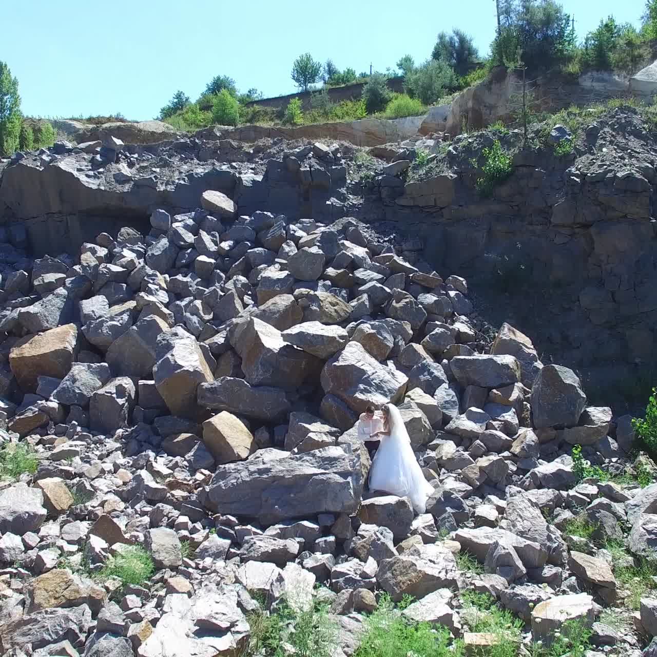 Couple Staying Over Stones