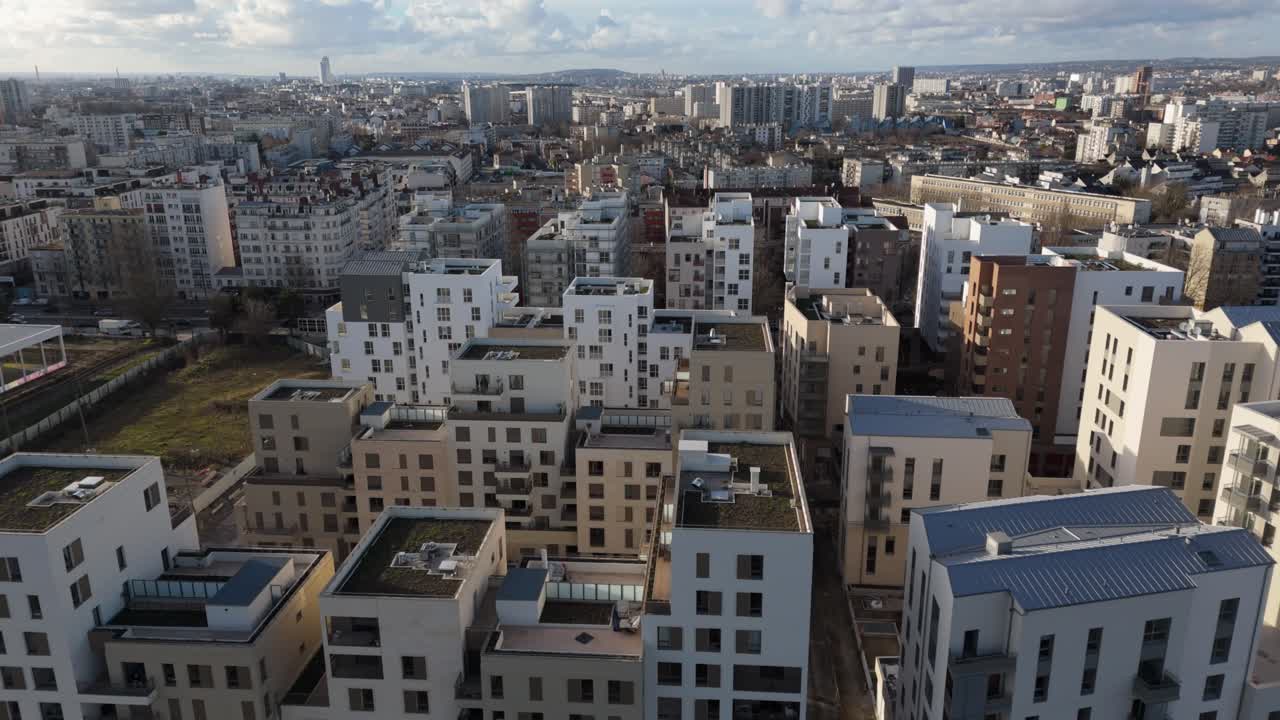 Paris suburban landscape with housing blocks, Fort d'Aubervilliers neighborhood, France. Aerial sideways