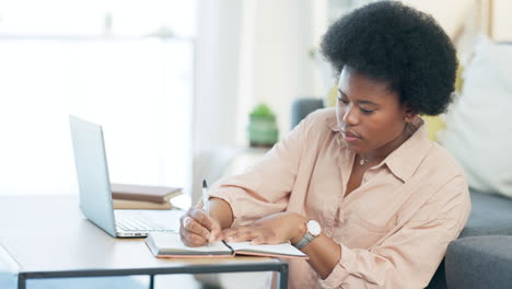 Female-student-studying-using-laptop