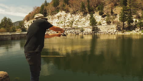 back side view of camper fishing in big bear like on california