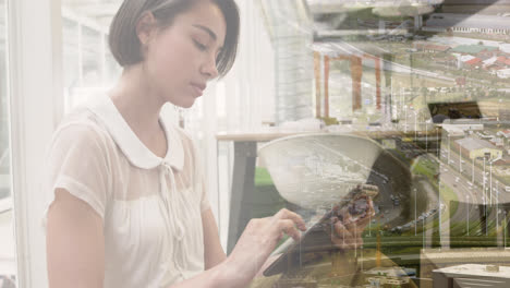 animation of caucasian businesswoman using tablet over cityscape