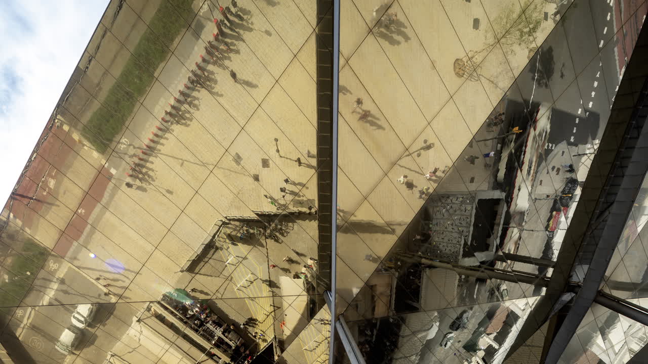 Timelapse of the encants second hand market with gloden reflecting roof in barcelona