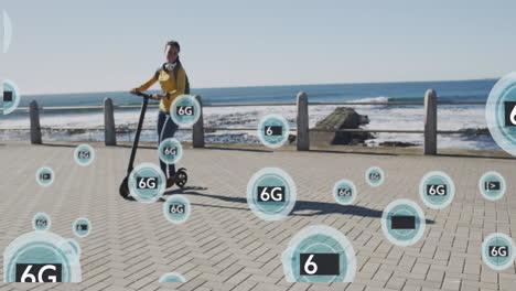 animation of 6g text in circles over happy biracial woman riding electric scooter by the sea