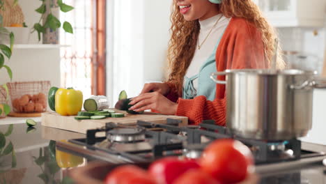 woman cooking vegetables