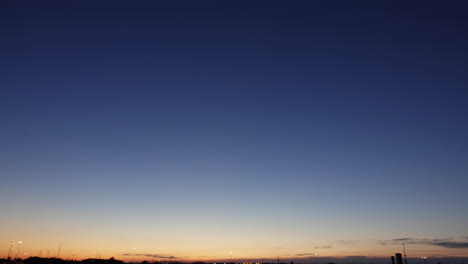 twilight sky after sunset over landscape