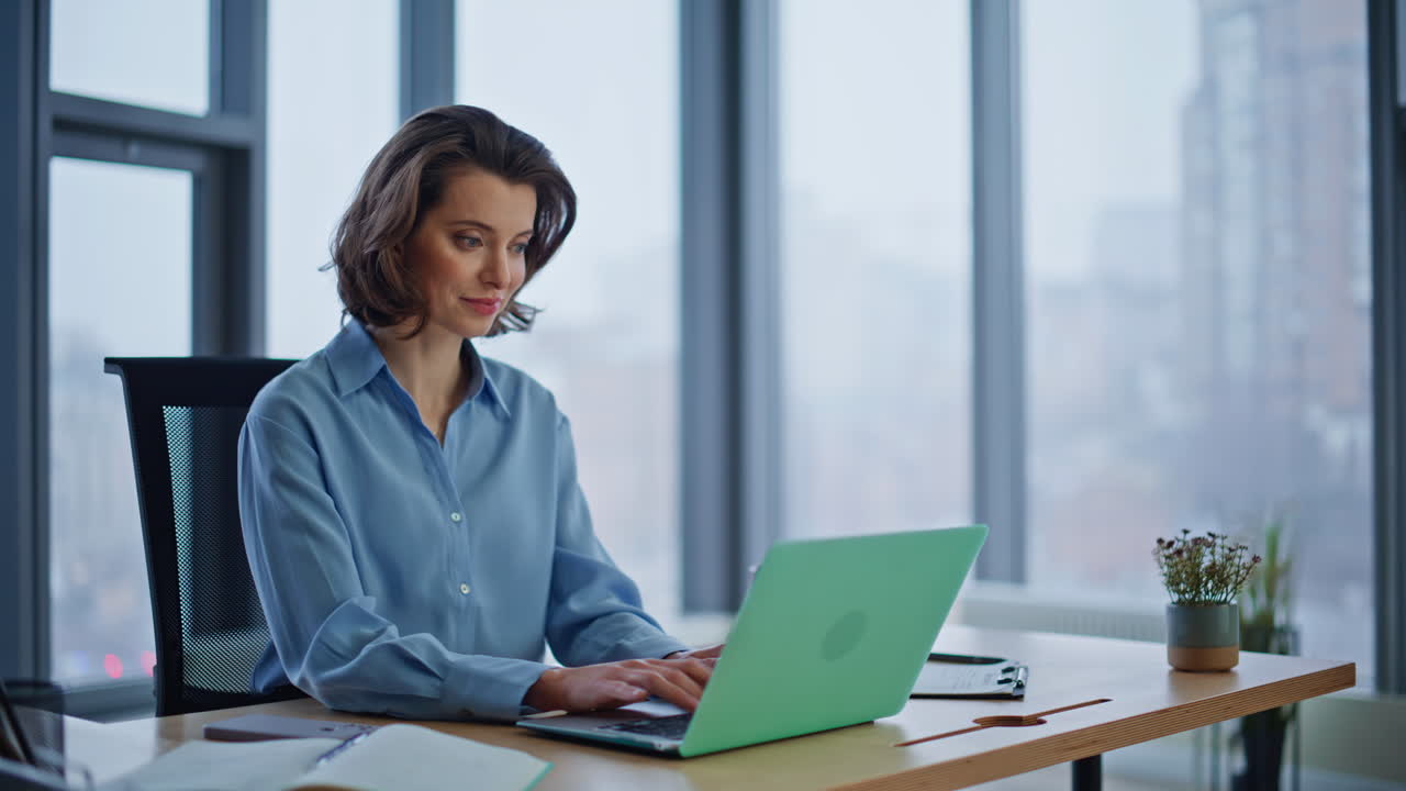 Financial manager reviewing papers at office closeup. Successful businesswoman