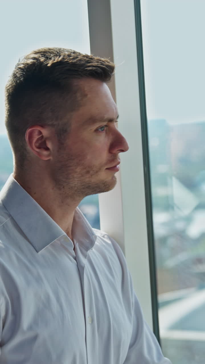 Businessman at Window