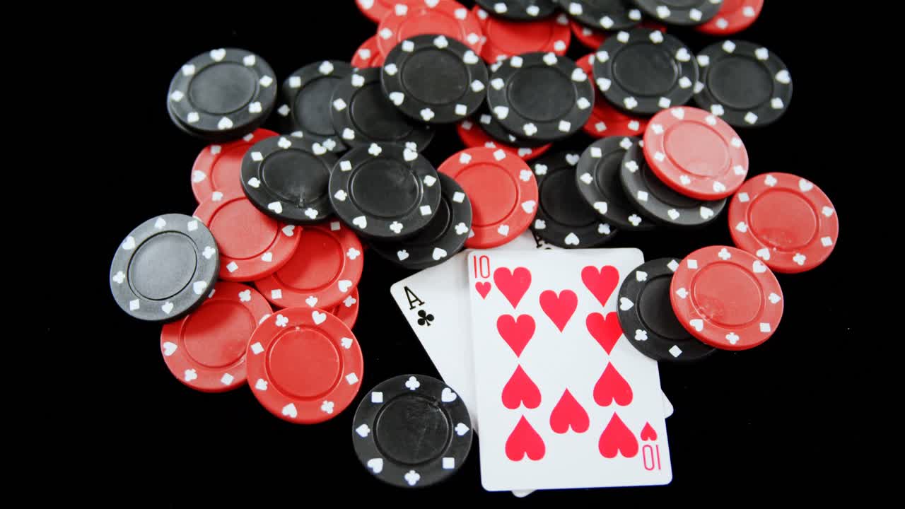 Playing cards and casino chips on poker table 4k
