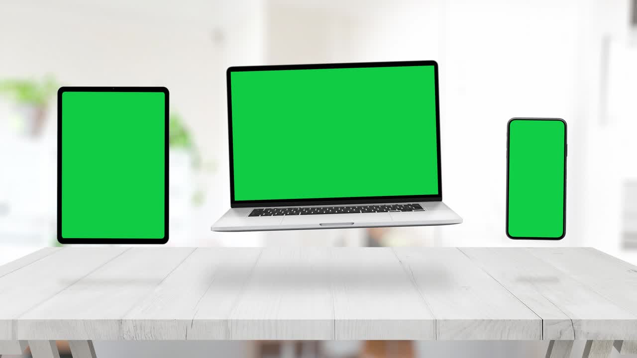 Levitating devices on office desk for responsive web design presentation