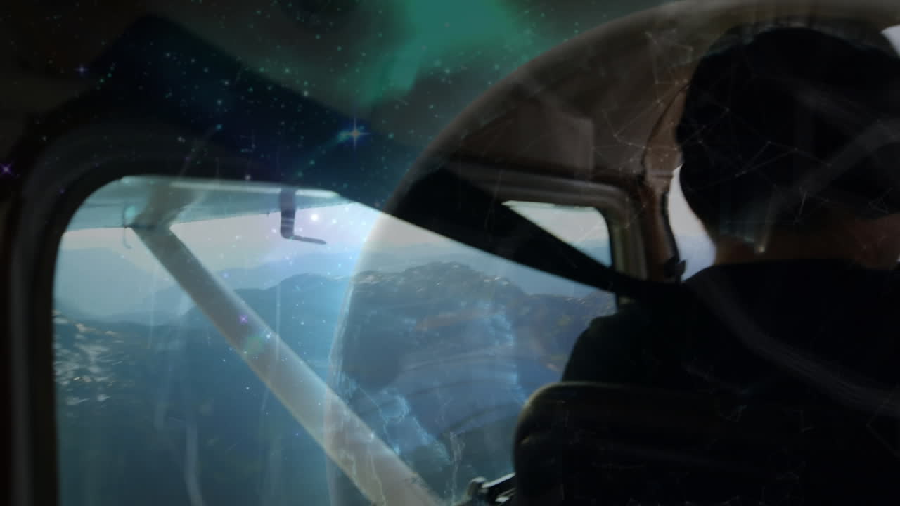 개인 항공기를 조종하는 두 명의 백인 조종사에 대한 회전 지구