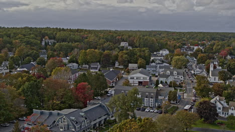 ogunquit maine aerial v6 cinematic low level flyover intown capturing cozy townscape with river inlet and white sandy beach during autumn season - shot with inspire 2, x7 camera - october 2021