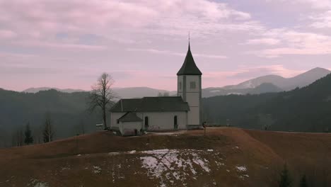 church on the meadow hill with dolly effect - zoom