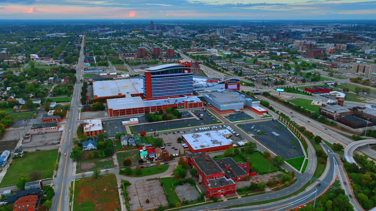 Detroit, USA, 11 August 2025: Panoramic sunset over Detroit skyline. Renaissance Center and river reflect under a vibrant evening sky