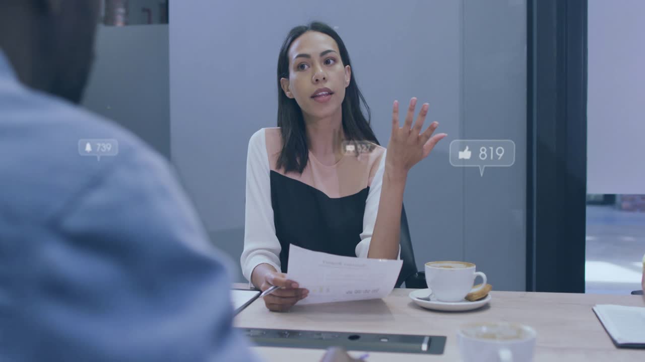 Woman leading business reading paper and making key points while like and comment icons growing